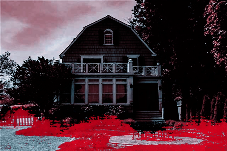 An edited photo of the Amityville Horror house photoshopped to look like the house is bleeding