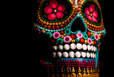 A skull painted in bright colors for Dia de Los Muertos